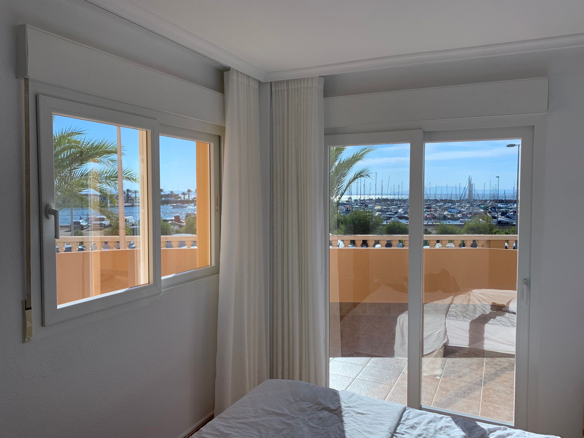 Before and after silver xtr solar window film installation in La manga Murcia