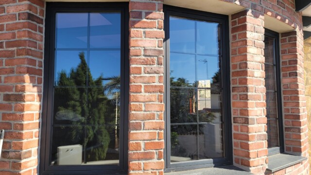 Installation of titanium solar window film in Benissa Alicante. Views from interior and exterior after installation